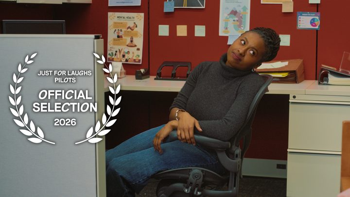 Still from All Four One: a coworker giving a sidelong glance from her office chair, with the Just For Laughs Pilots Official Selection laurel