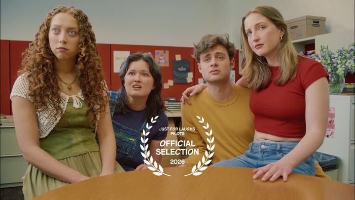 Still from All Four One: the four gathered around an office table, with the Just For Laughs Pilots Official Selection laurel
